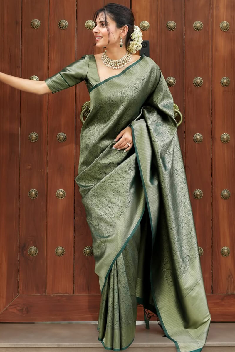 Adorable Dark Green Soft Silk Saree With Beguiling Blouse Piece
