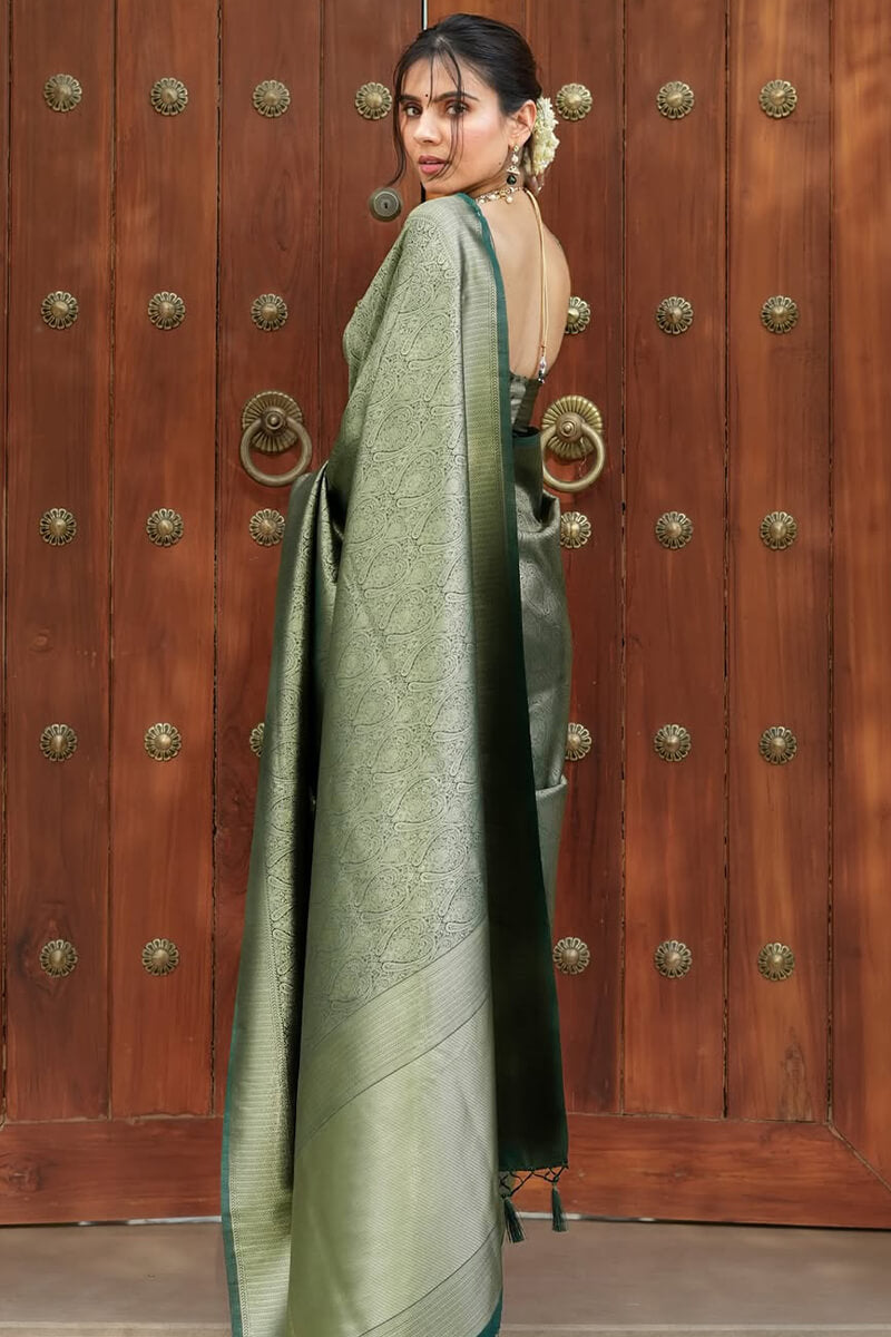 Adorable Dark Green Soft Silk Saree With Beguiling Blouse Piece