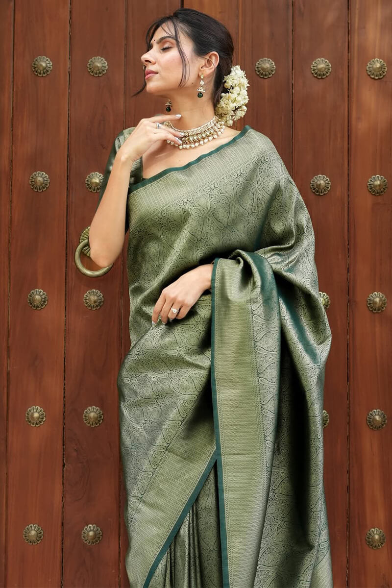Adorable Dark Green Soft Silk Saree With Beguiling Blouse Piece