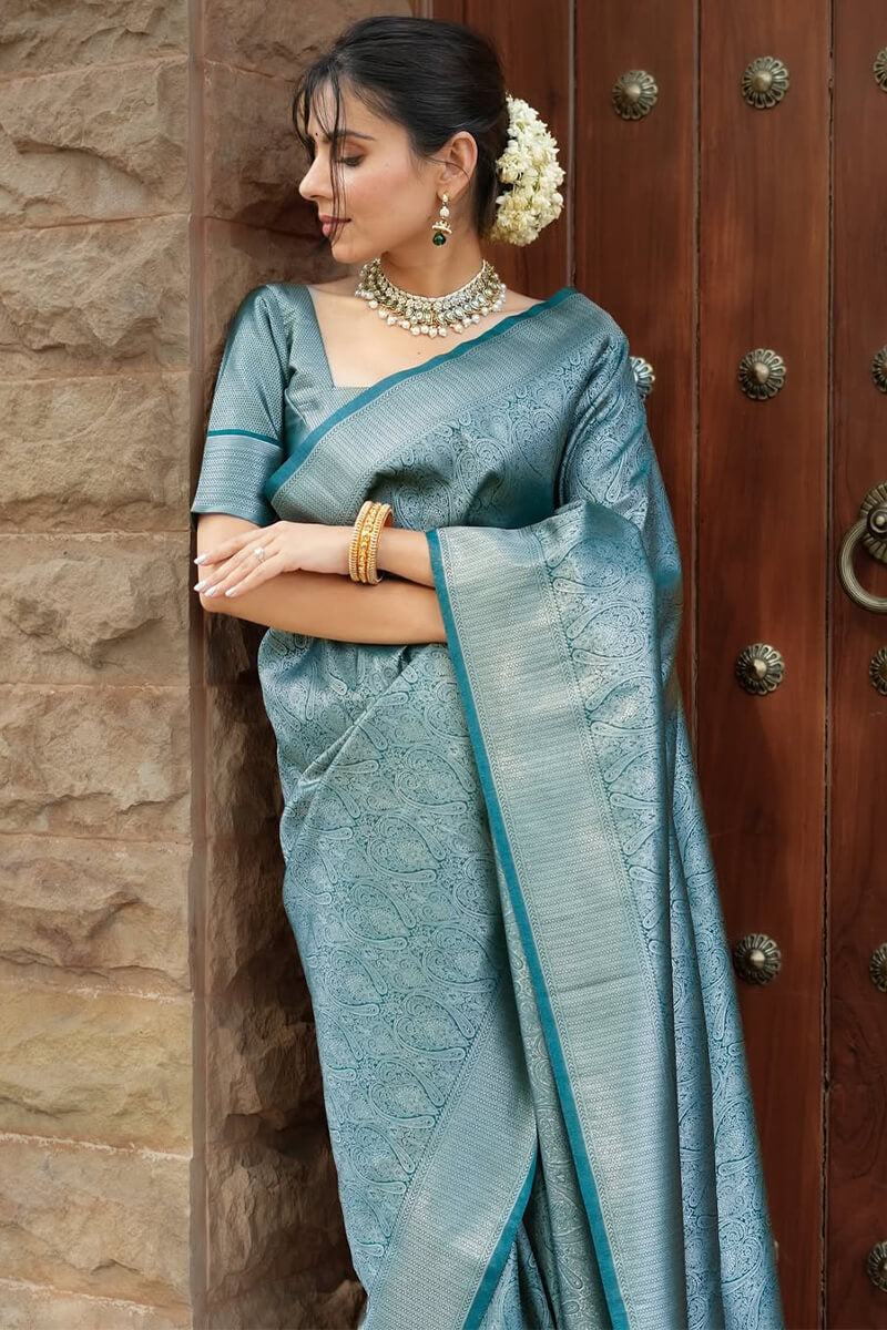 Exquisite Rama Soft Silk Saree With Unequalled Blouse Piece