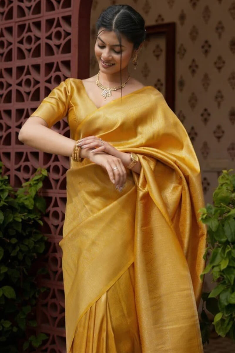 Jubilant Yellow Soft Silk Saree With Adoring Blouse Piece
