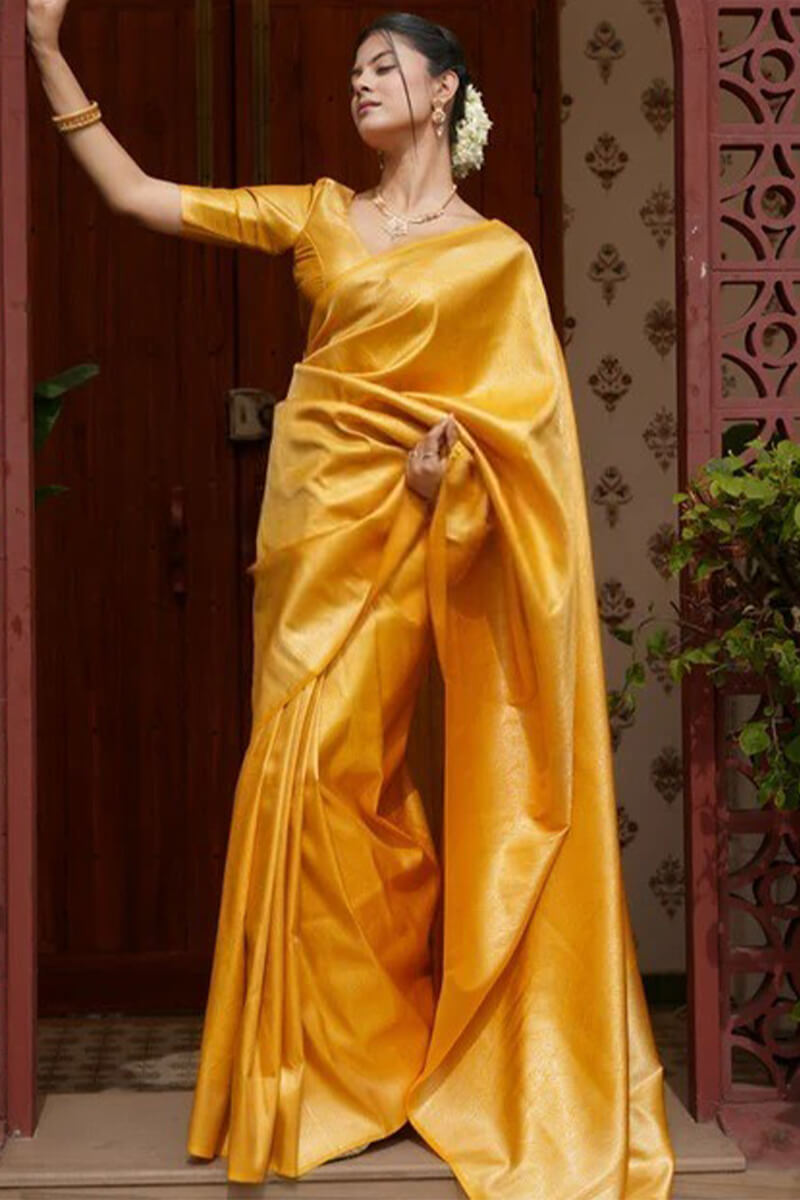 Jubilant Yellow Soft Silk Saree With Adoring Blouse Piece
