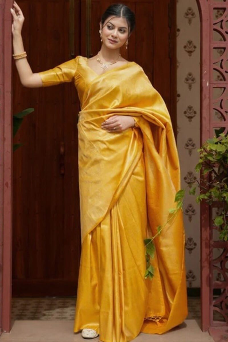 Jubilant Yellow Soft Silk Saree With Adoring Blouse Piece