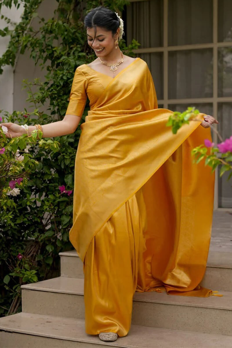 Jubilant Yellow Soft Silk Saree With Adoring Blouse Piece