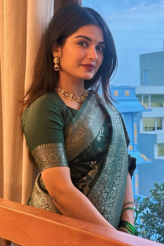 Wonderful Dark Green Soft Silk Saree With Scrumptious Blouse Piece