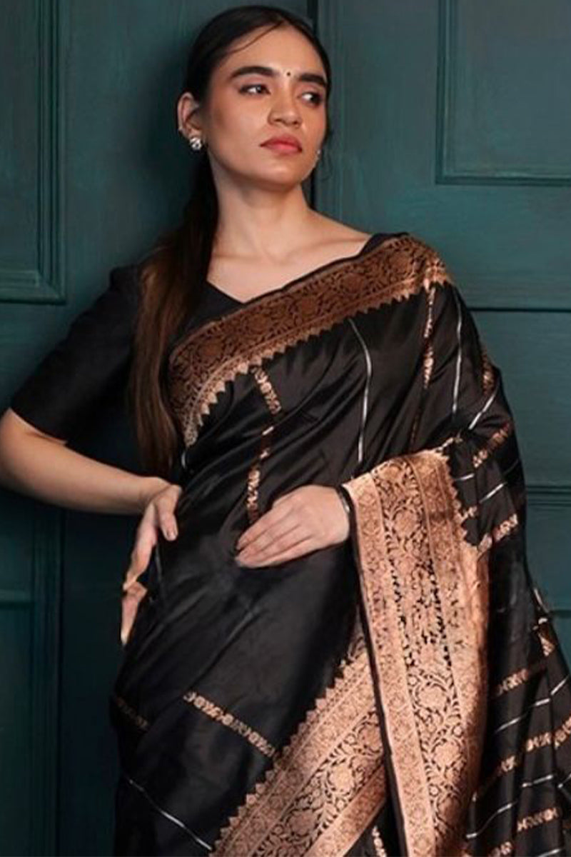 Radiant Black Soft Silk Saree With Jazzy Blouse Piece