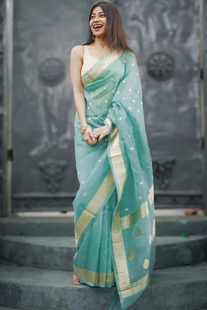 Ebullience Turquoise Linen Silk Saree With Bewitching Blouse Piece