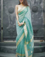 Ebullience Turquoise Linen Silk Saree With Bewitching Blouse Piece