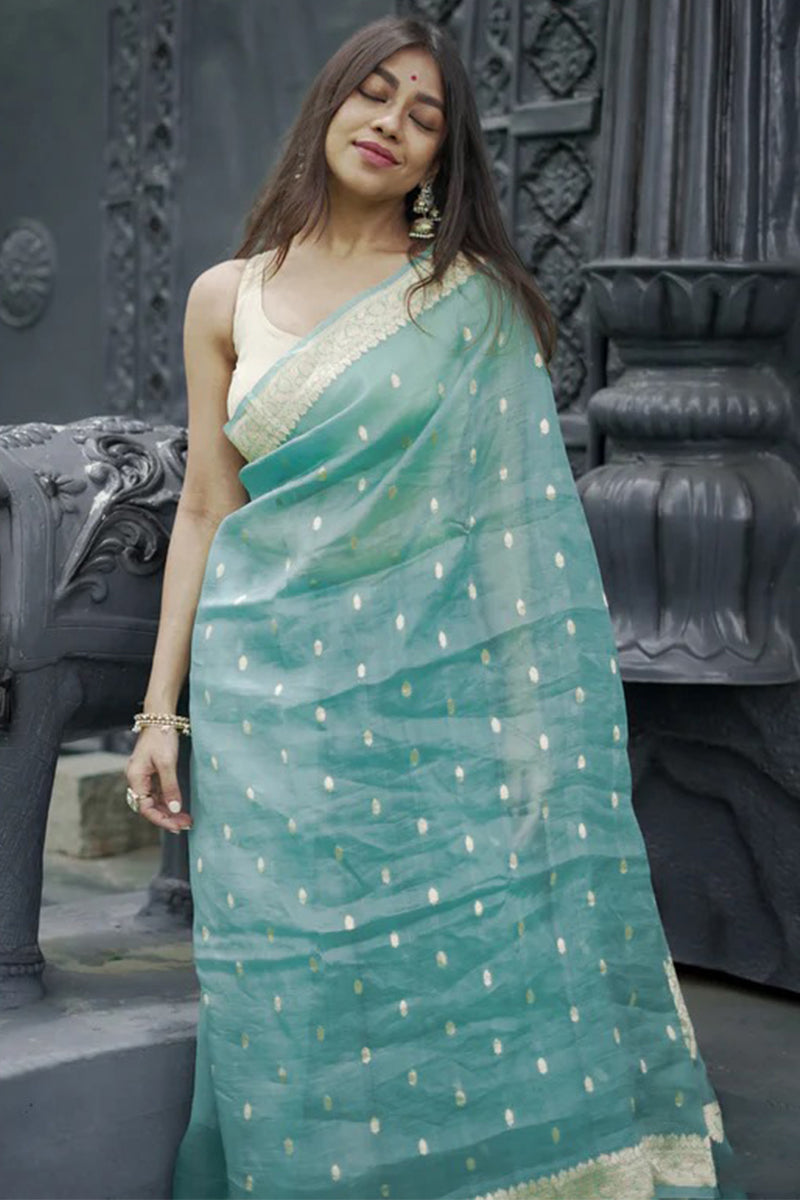 Ebullience Turquoise Linen Silk Saree With Bewitching Blouse Piece