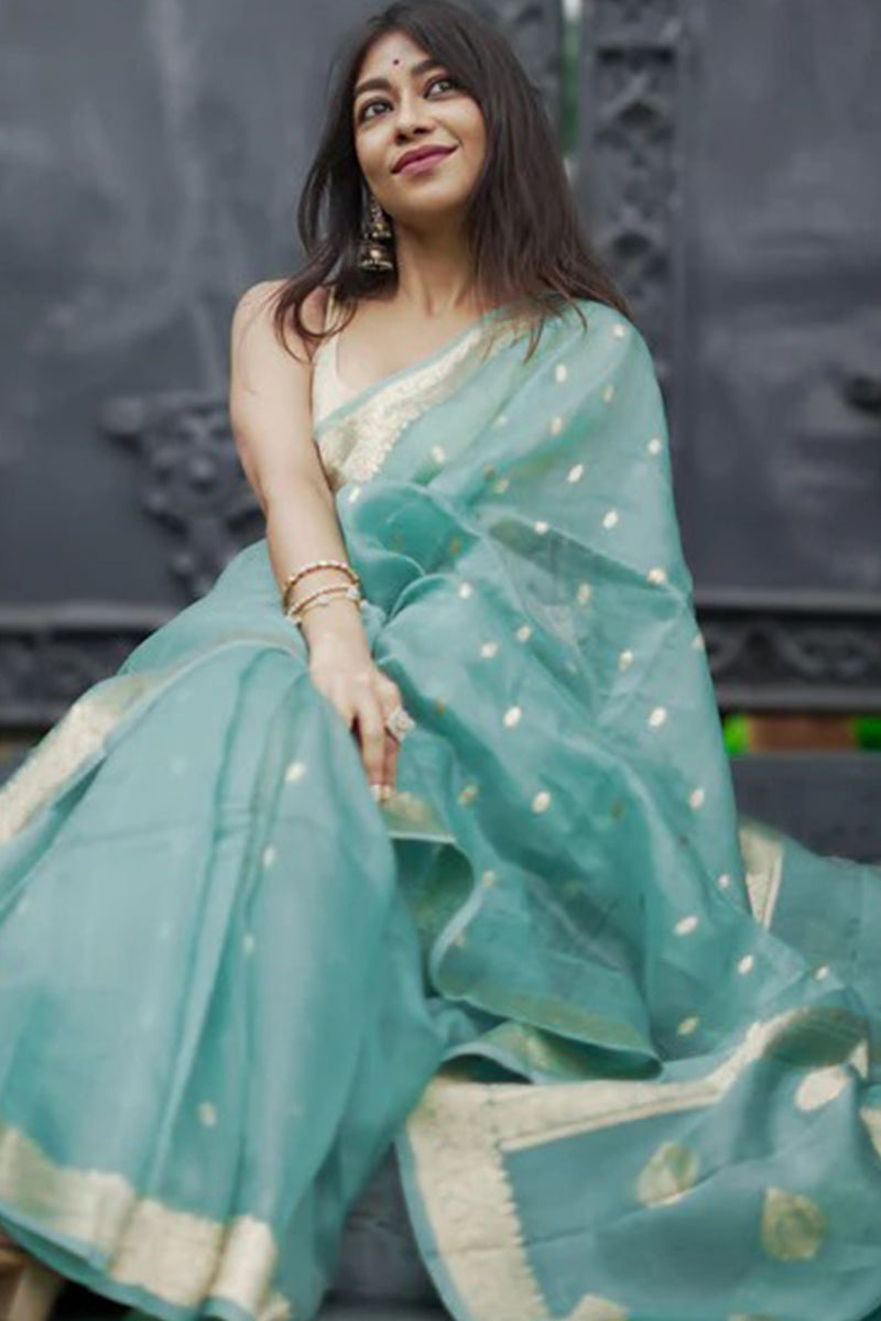 Ebullience Turquoise Linen Silk Saree With Bewitching Blouse Piece