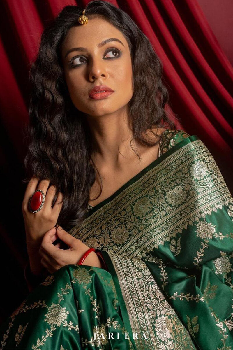 Resonant Dark Green Soft Silk Saree With Embellished Blouse Piece
