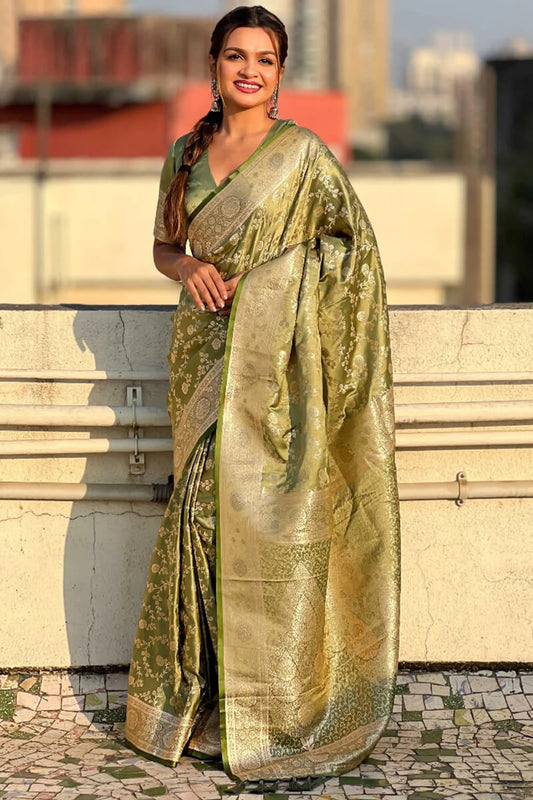 Angelic Green Soft Silk Saree With Resplendent Blouse Piece