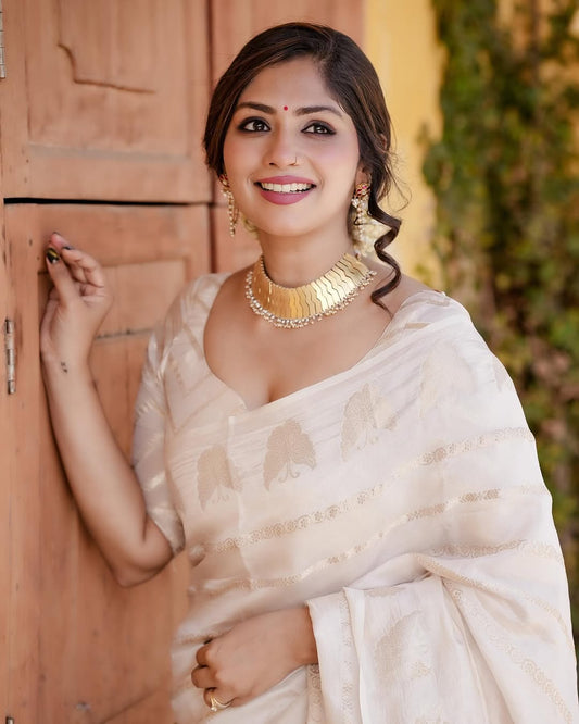 Luminous Off White Soft Silk Saree With Capricious Blouse Piece