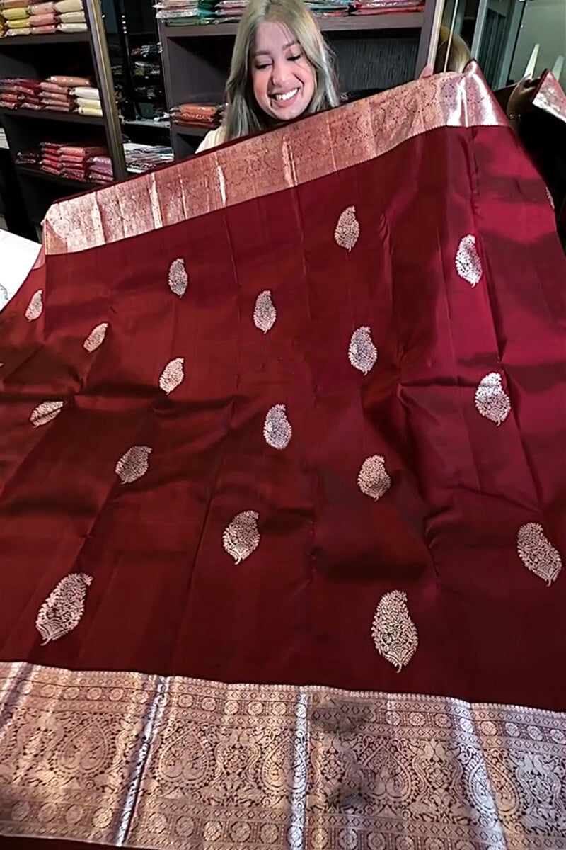 Excellent Wine Soft Banarasi Silk Saree With Sempiternal Blouse Piece