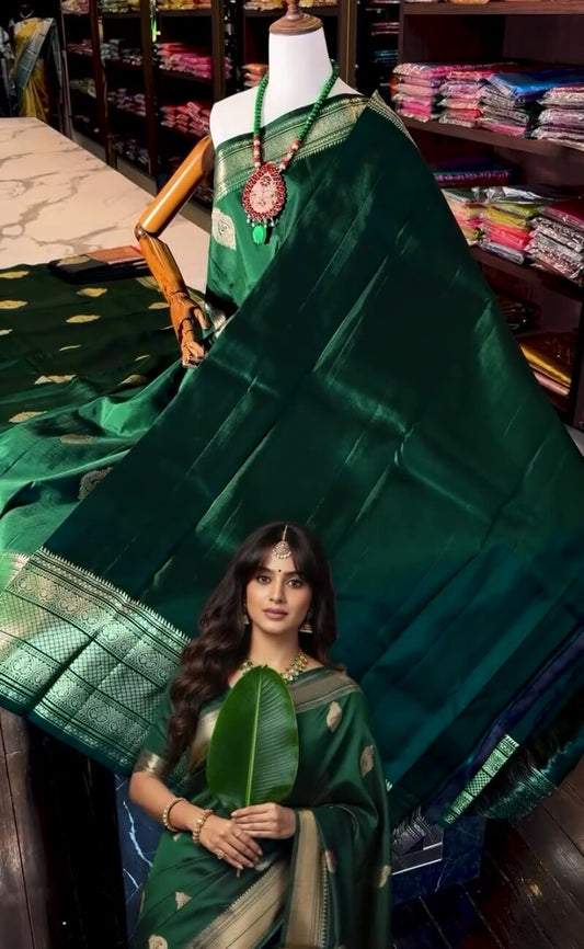 Glorious Dark Green Soft Banarasi Silk Saree With Surpassing Blouse Piece