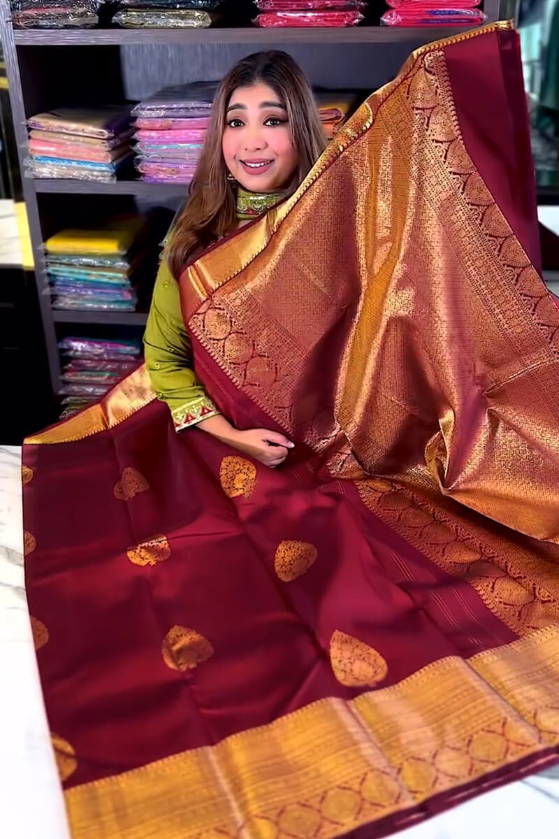 Bewitching Wine Soft Banarasi Silk Saree With Assemblage Blouse Piece