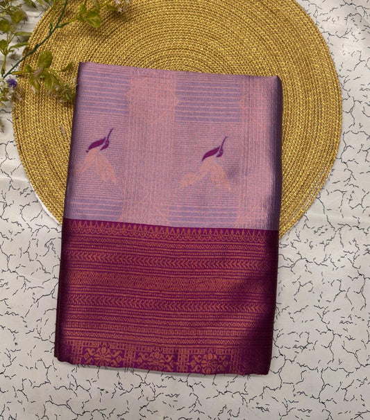 Supernal Lavender Soft Banarasi Silk Saree With Ornate Blouse Piece