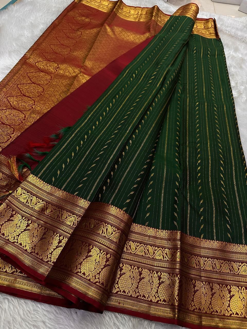 Bewitching Dark Green Soft Silk Saree With Lustrous Blouse Piece