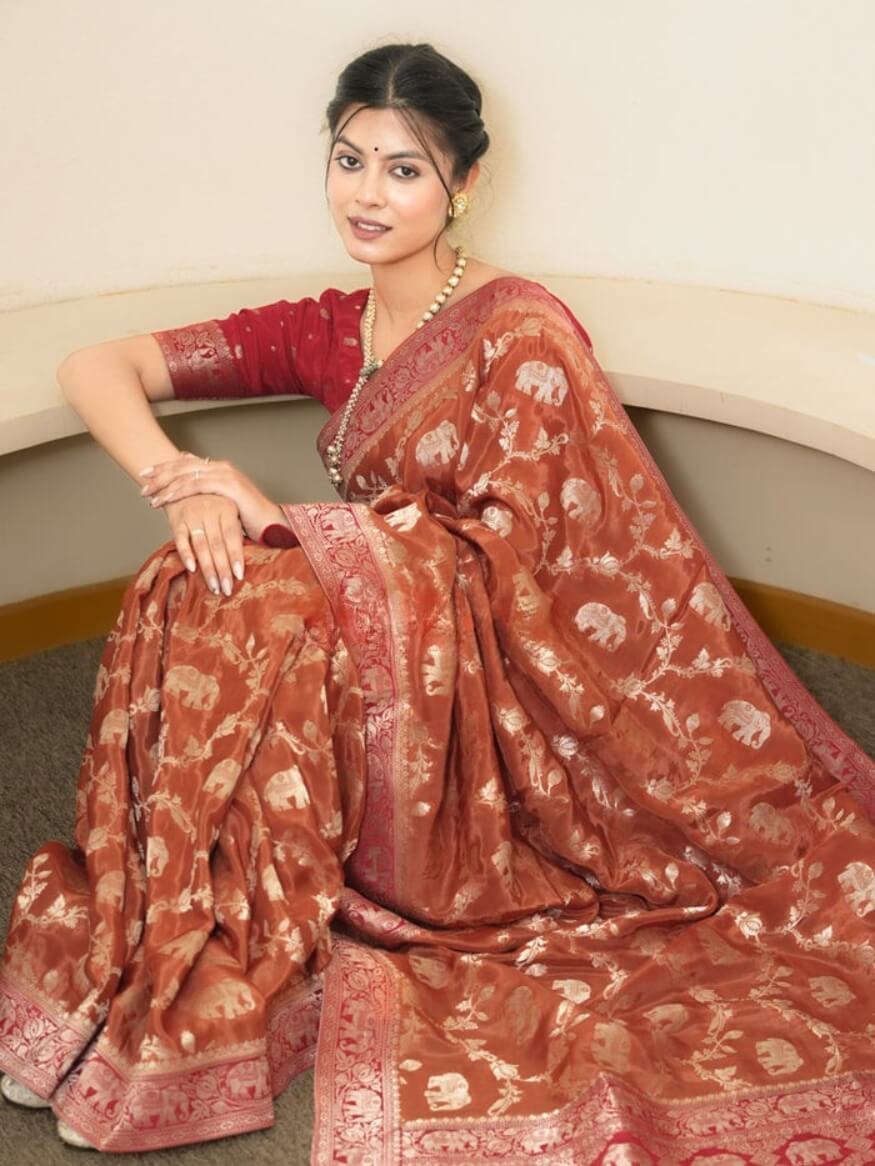 Divine Orange Soft Silk Saree With Rhapsodic Blouse Piece