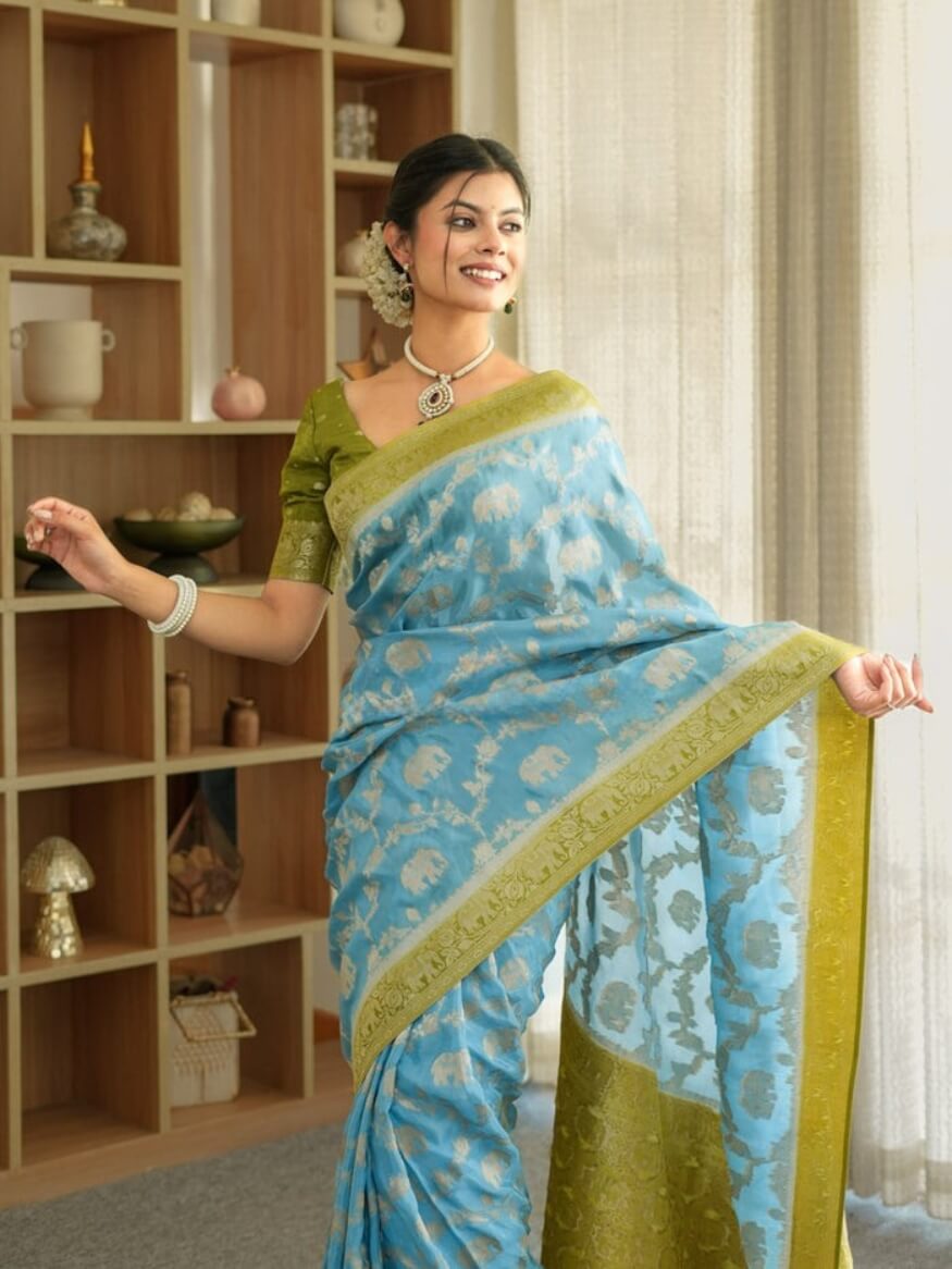 Fairytale Sky Soft Silk Saree With Profuse Blouse Piece