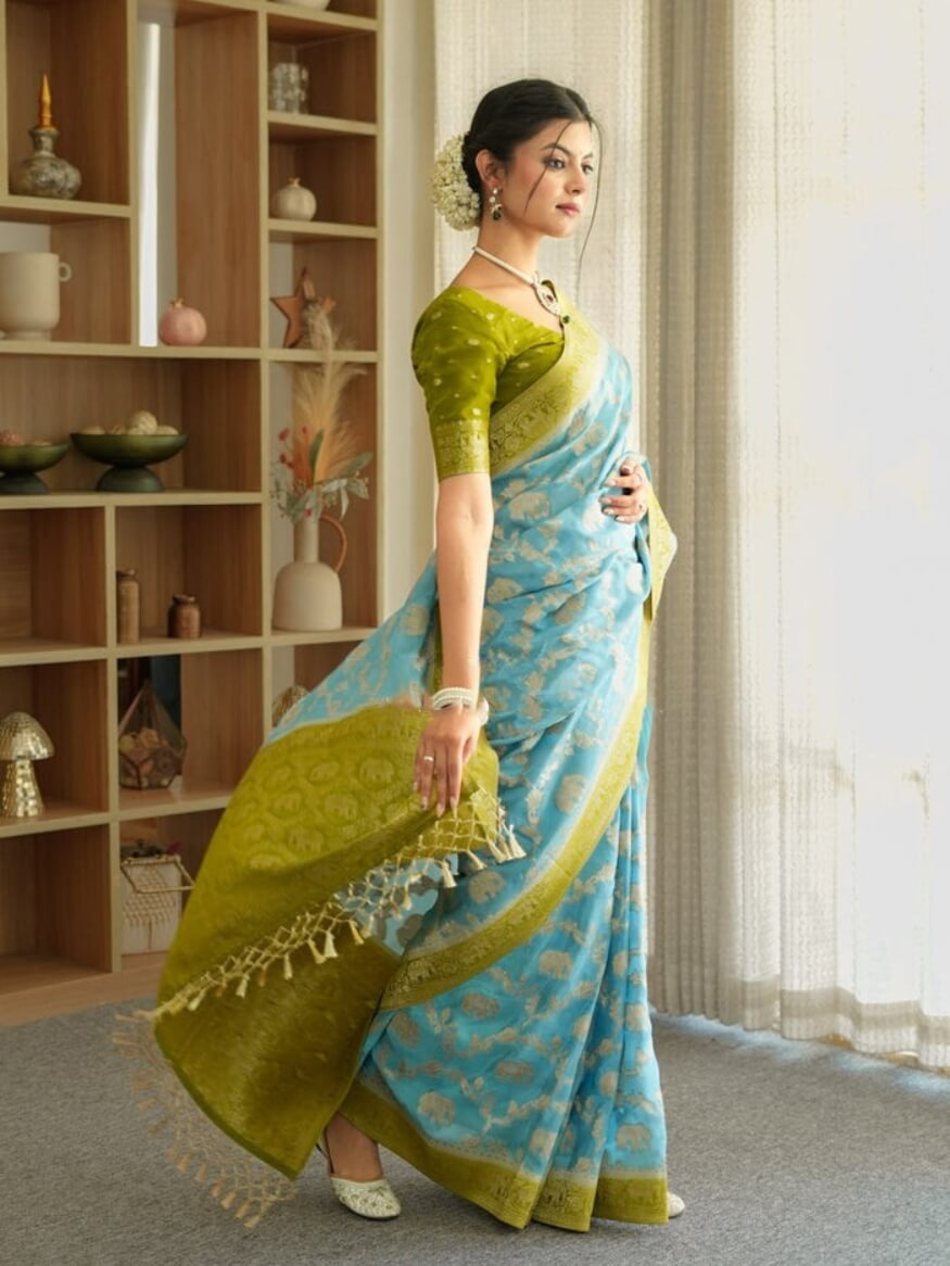Fairytale Sky Soft Silk Saree With Profuse Blouse Piece