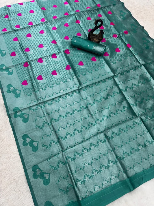 Flaunt Sea Green Soft Banarasi Silk Saree With Ornate Blouse Piece