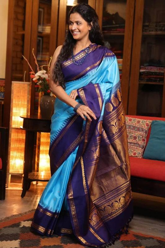 Arresting Firozi Soft Silk Saree With Profuse Blouse Piece
