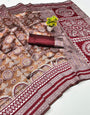 Conflate Maroon Pure Zari Weaving Banarasi Silk Saree With Glowing Blouse Piece