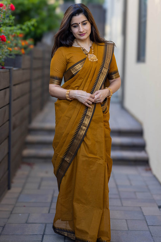 Enamoring Mustard Cotton Silk Saree With Fancifull Blouse Piece