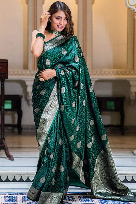 Diaphanous Dark Green Soft Silk Saree With Evanescent Blouse Piece