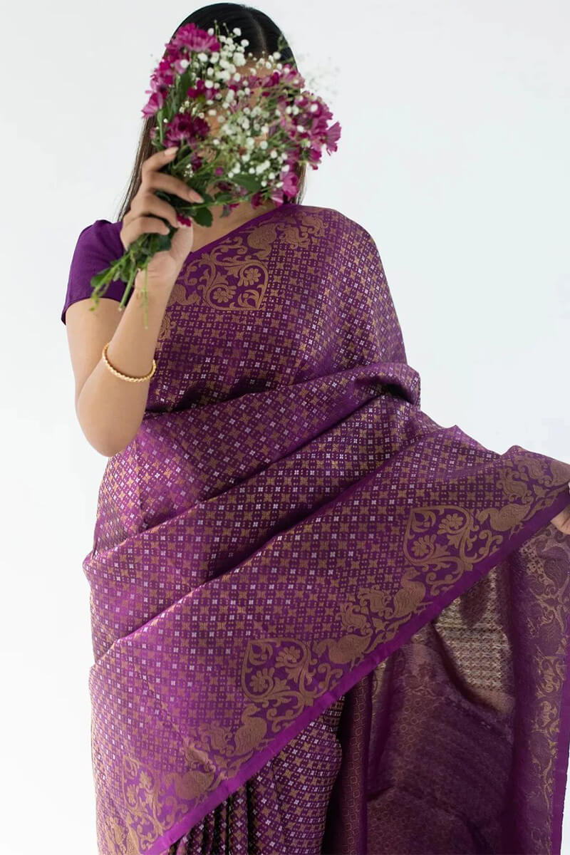 Adoring Purple Soft Silk Saree With Ideal Blouse Piece