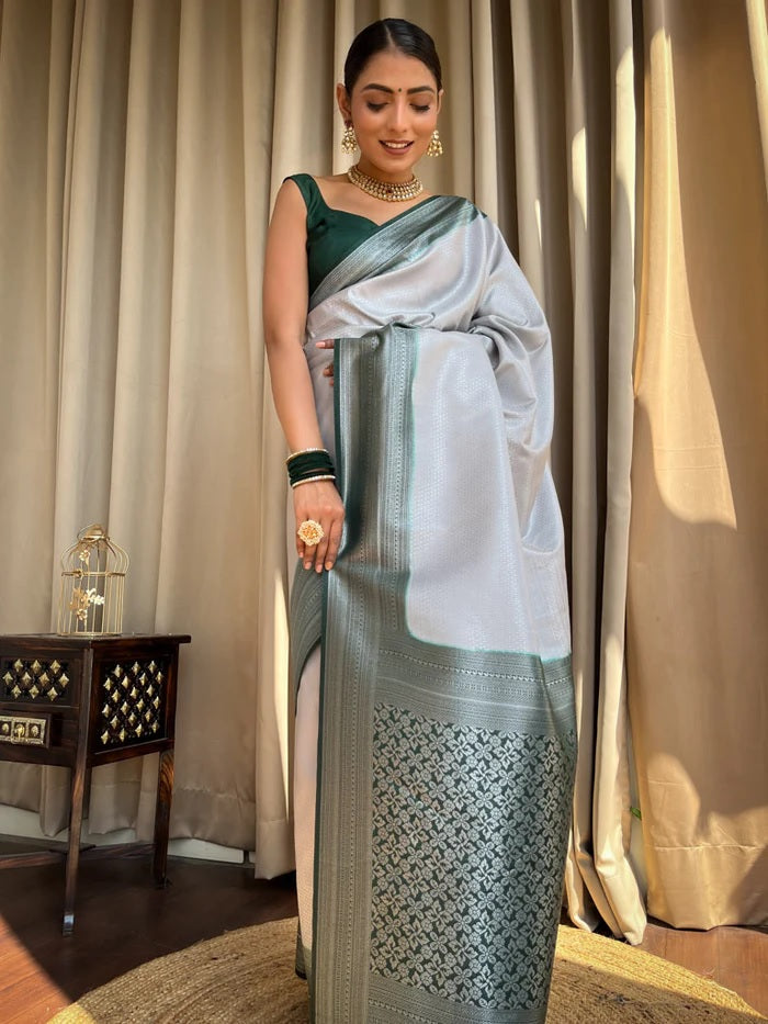 Engrossing Grey Soft Silk Saree With Invaluable Blouse Piece