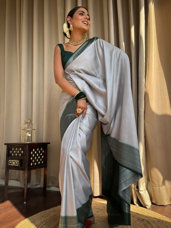 Engrossing Grey Soft Silk Saree With Invaluable Blouse Piece