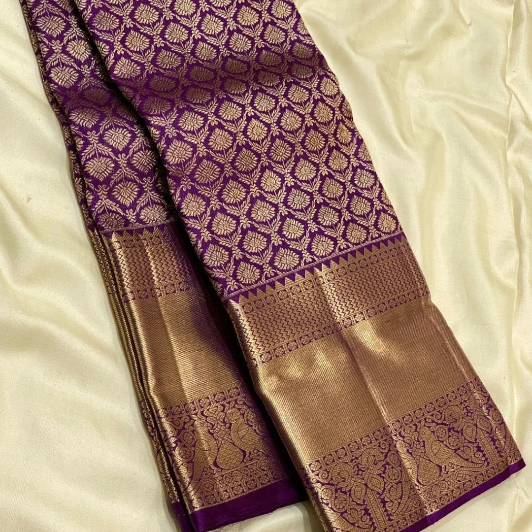 Dazzling Purple Soft Banarasi Silk Saree With Adorning Blouse Piece