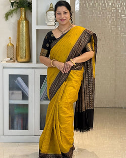 Smashing Yellow Soft Silk Saree With Evocative Blouse Piece