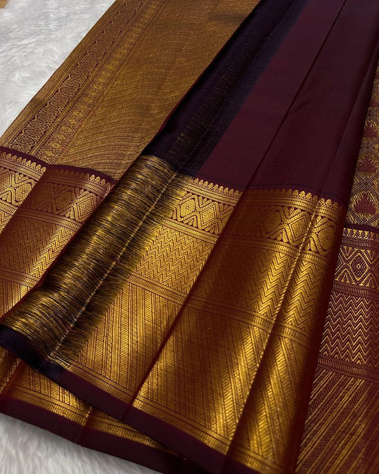Beleaguer Wine Soft Banarasi Silk Saree With Fugacious Blouse Piece