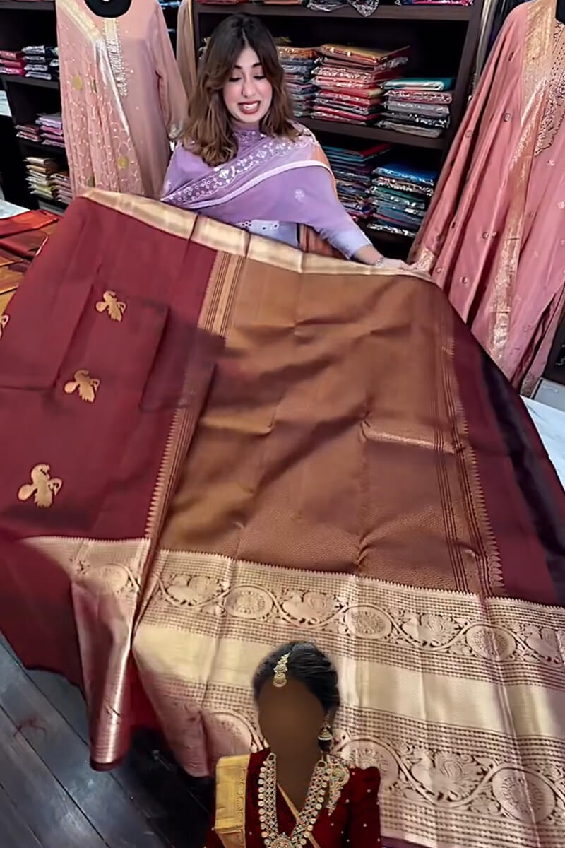 Majesty Wine Soft Banarasi Silk Saree With Blissful Blouse Piece