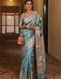 Embellished Firozi Soft Banarasi Silk Saree With Glorious Blouse Piece