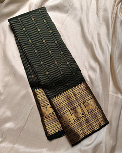 Angelic Dark Green Soft Banarasi Silk Saree With Intricate Blouse Piece