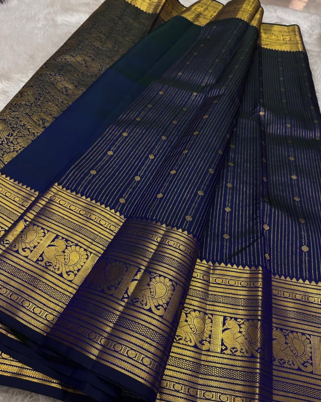 Surpassing Navy Blue Soft Banarasi Silk Saree With Gorgeous Blouse Piece