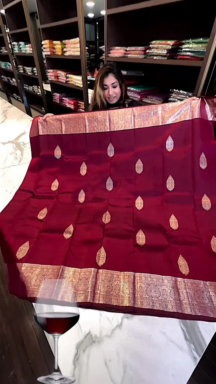 Symmetrical Wine Soft Banarasi Silk Saree With Angelic Blouse Piece