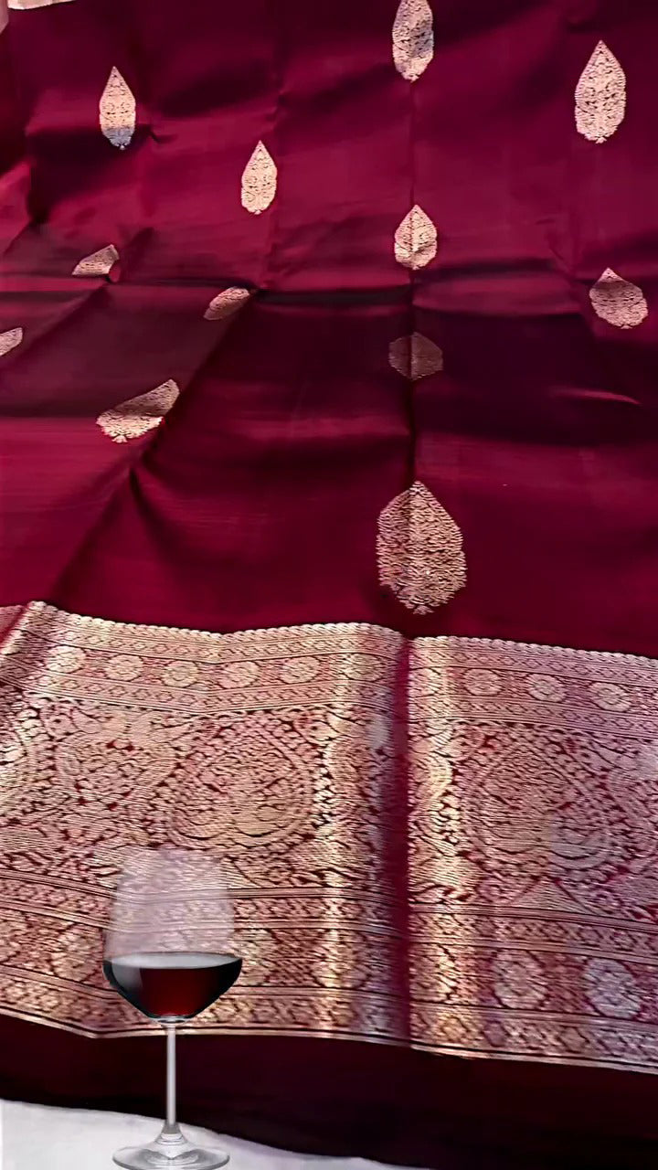 Symmetrical Wine Soft Banarasi Silk Saree With Angelic Blouse Piece