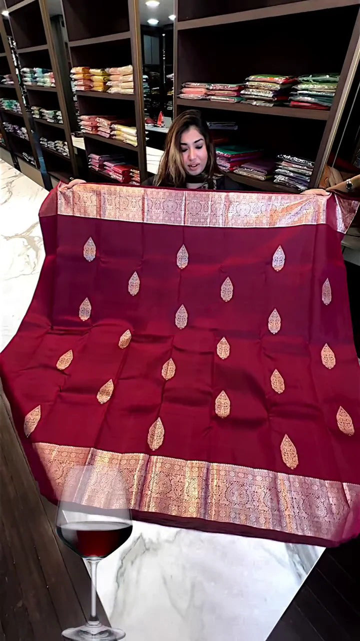 Symmetrical Wine Soft Banarasi Silk Saree With Angelic Blouse Piece
