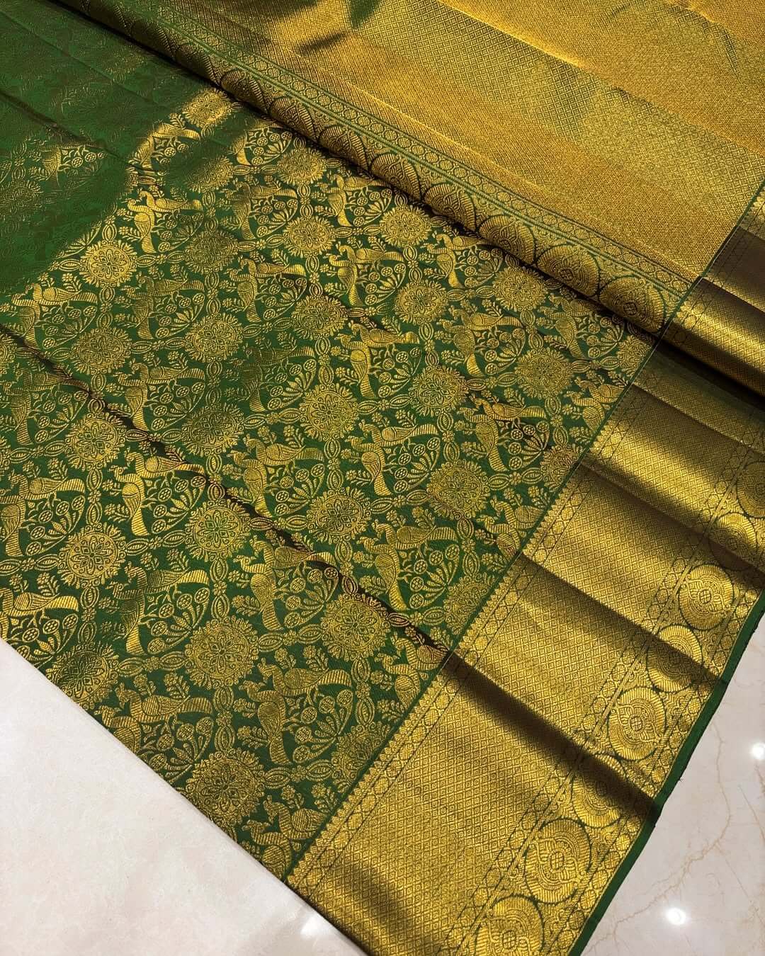 Capricious Dark Green Soft Banarasi Silk Saree With Assemblage Blouse Piece