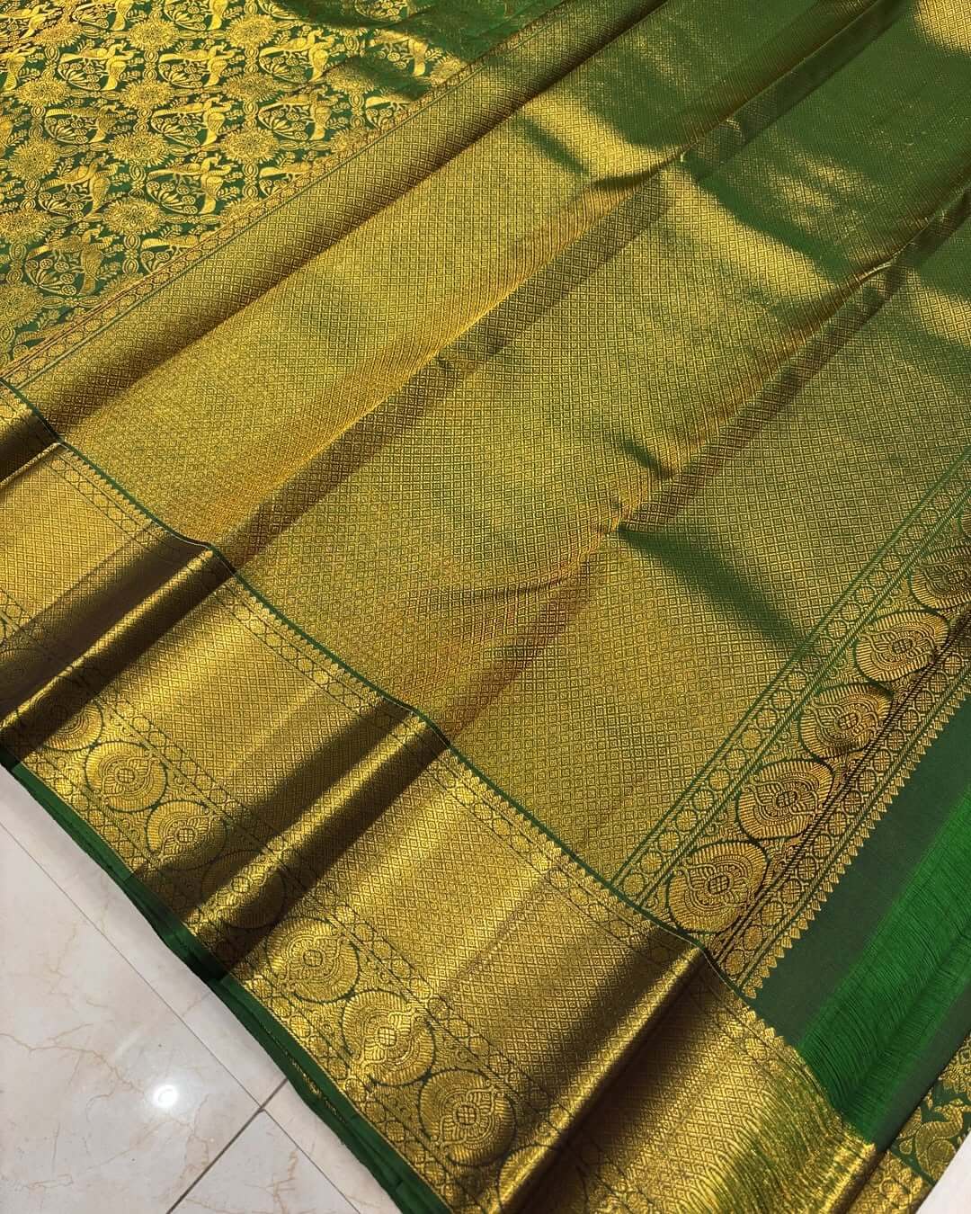 Capricious Dark Green Soft Banarasi Silk Saree With Assemblage Blouse Piece
