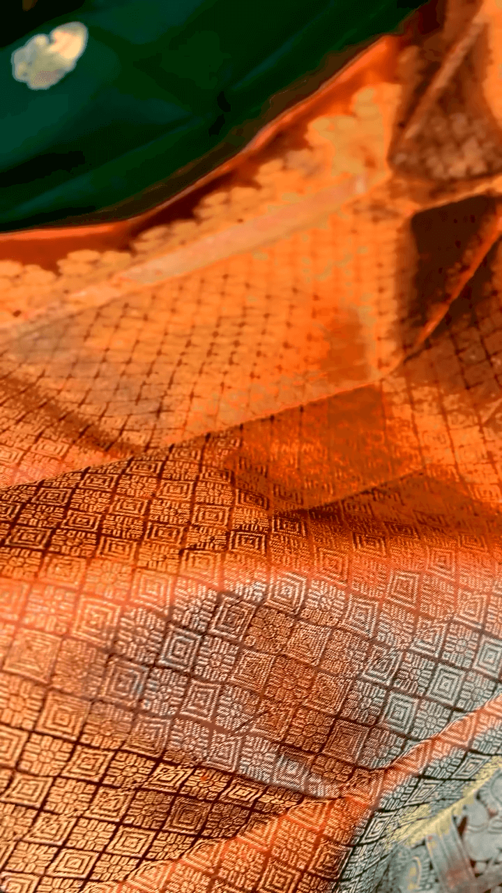 Majesty Dark Green Soft Banarasi Silk Saree With Mesmeric Blouse Piece