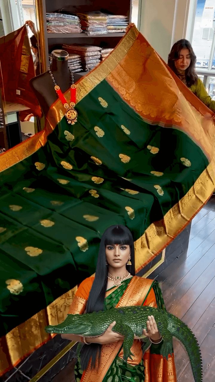 Majesty Dark Green Soft Banarasi Silk Saree With Mesmeric Blouse Piece