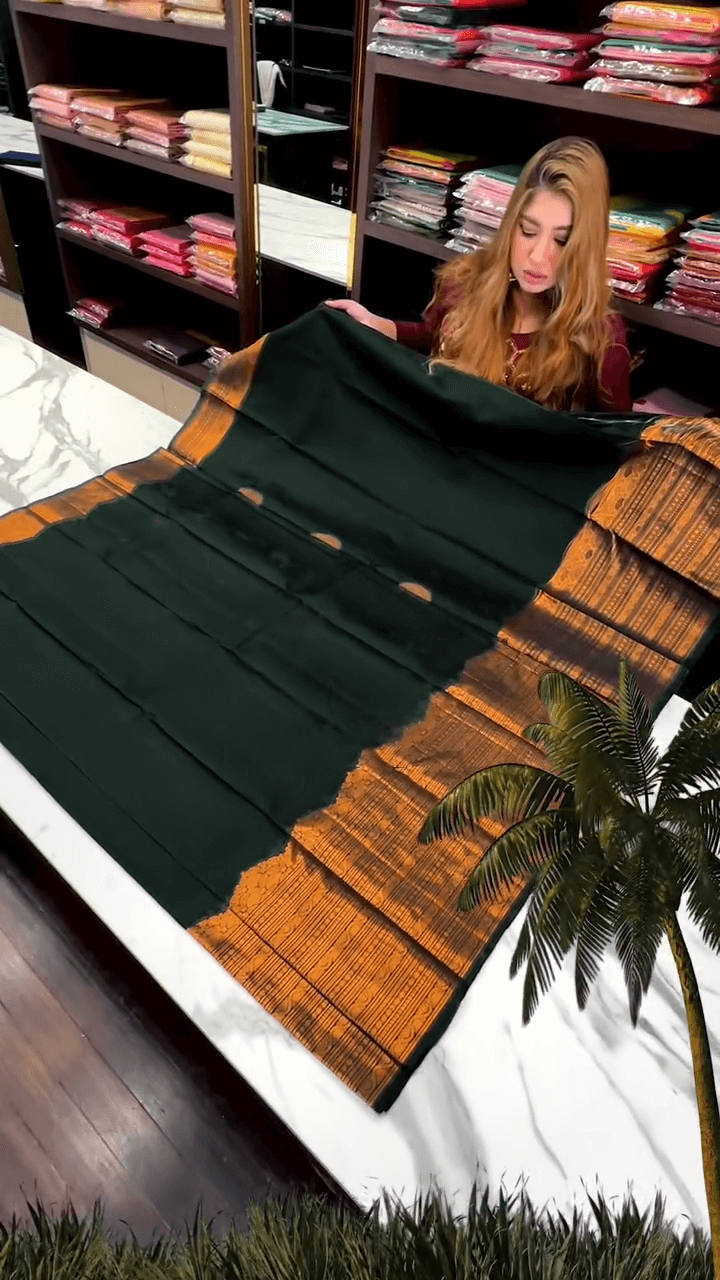 Adoring Dark Green Soft Banarasi Silk Saree With Designer Blouse Piece
