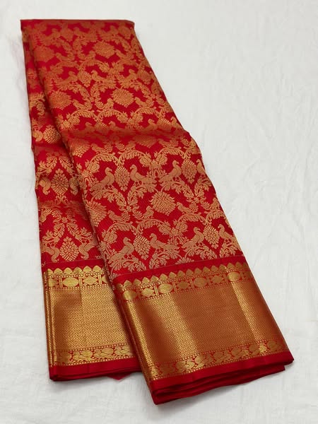Opulent Red Soft Banarasi Silk Saree With Inspiring Blouse Piece