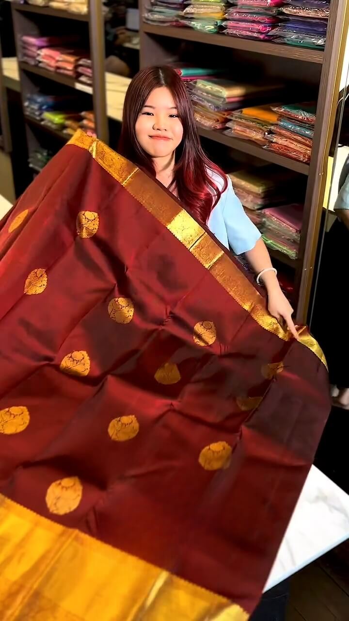 Elaborate Maroon Soft Banarasi Silk Saree With Resplendent Blouse Piece